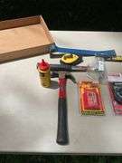 Flat of hammers, bars, tape measures, utility knives, chalk line