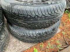 (4) 205/70r15 Tires on 5 Bolt Rims, (2) 215/55r16 Tires on 5 Bolt Rims