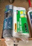 3 rolls of plastic and a work light