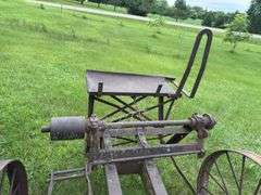Steel wheeled cart(was once a saw rig) with Farm Master, Sears Roebuck and