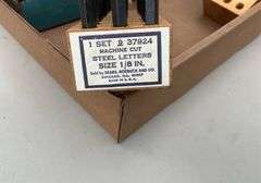 Flat of steel letters, 1/8" ; hole saw bits