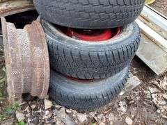 Assorted rims and tires - 5 and 6 bolt, 14” and 15” tires