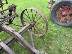 Steel wheeled cart(was once a saw rig) with Farm Master, Sears Roebuck and