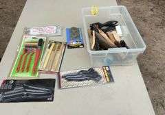 Tote of wire brushes, toggle pliers