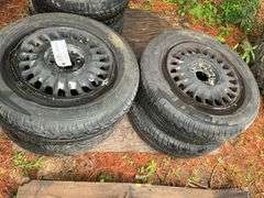 (4) 205/70r15 Tires on 5 Bolt Rims, (2) 215/55r16 Tires on 5 Bolt Rims