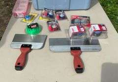 Tote of string trimmer line, pad locks, misc