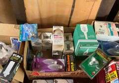 4 boxes of lights and light bulbs
