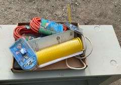 Flat of extension cords, air hose, hex keys, tape measure