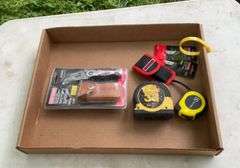 Flat of tape measures, razor blade knives