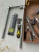 flat with evolv 10pc 1/4" drive socket set, tape measures, screw drivers, p