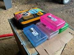 Flat of pencil boxes and three ring binder