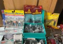 2 boxes of train related accessories