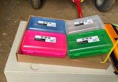 Flat of pencil boxes and three ring binder