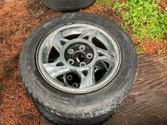 (4) 205/70r15 Tires on 5 Bolt Rims, (2) 215/55r16 Tires on 5 Bolt Rims