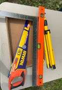 carpenter square, hand saw, level, work light stand