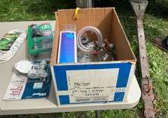 Box of plumbing supplies