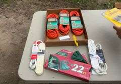Tote of extension cords & power strips