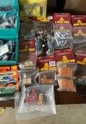2 boxes of train related accessories