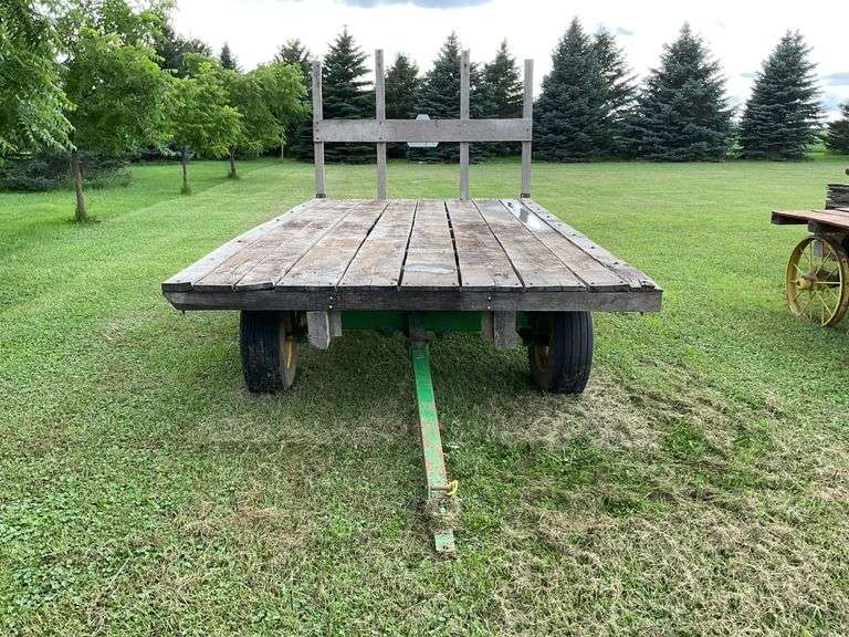 16ft x 8ft Hay rack on JD 10 ton running gear