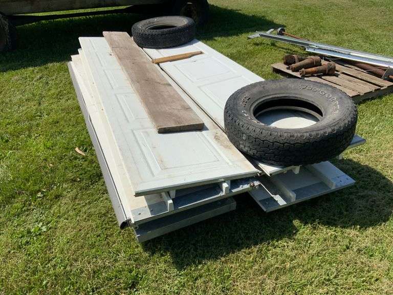 Over head Garage Door with springs, may be missing parts, may have extra pa