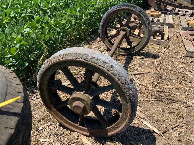 Old cast rubber tire axle & wheels : "the 4-wheel drive auto company" Watom
