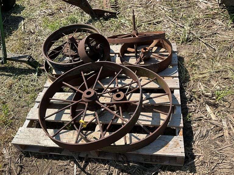 (2) 28" iron wheels w/hubs & misc pulleys & wheels