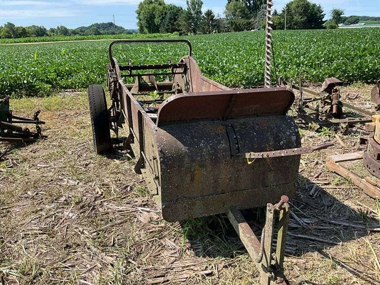 JD pull type manure spreader