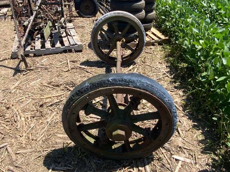 Old cast rubber tire axle & wheels : "the 4-wheel drive auto company" Watom