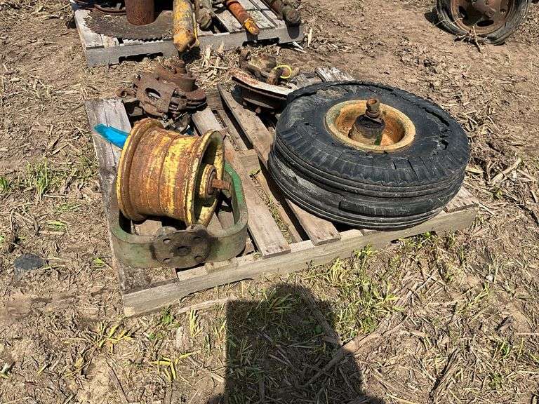 Pallet of John Deere front end single rims & mounts w/2 brake assemblies
