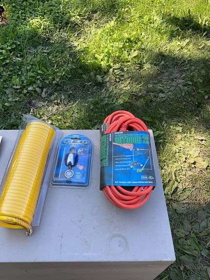 Flat of extension cords, air hose, hex keys, tape measure