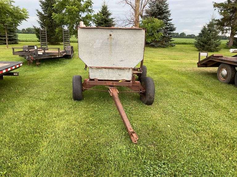 Walsh metal flare box on running gear w/ firewood