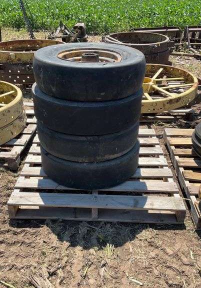 (4) Contractor packing wheels on rims, 7.50-15