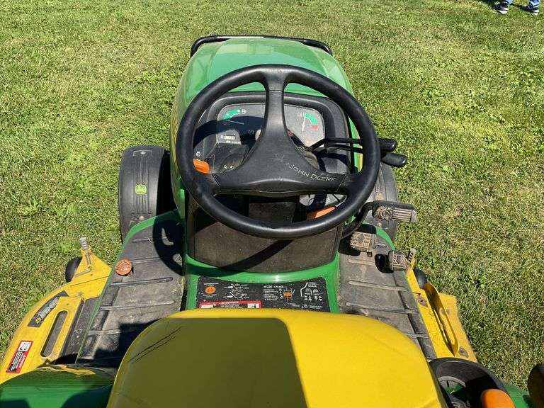 John Deere X595 Lawn Mower, 1,577 Hours, w/62” Deck, 4x4, Front Grill, Side