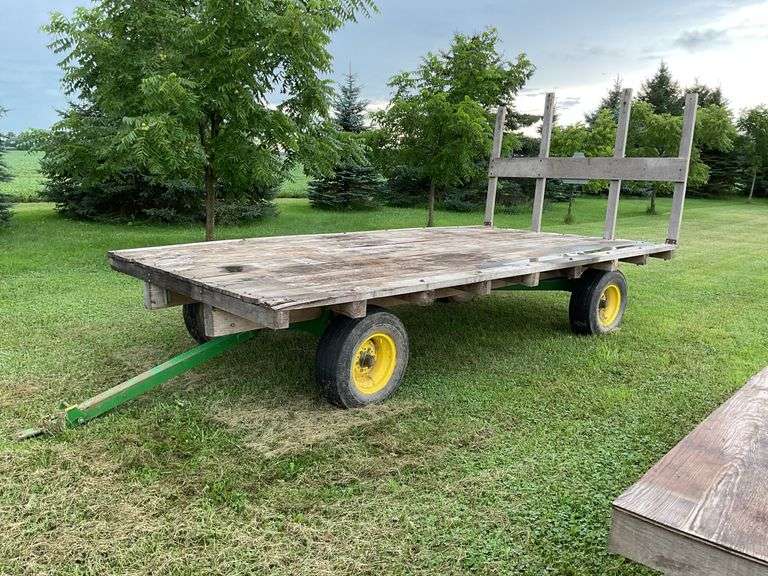 16ft x 8ft Hay rack on JD 10 ton running gear