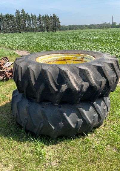 2- 18.4-34 tires axle mount rims, 9 bolt