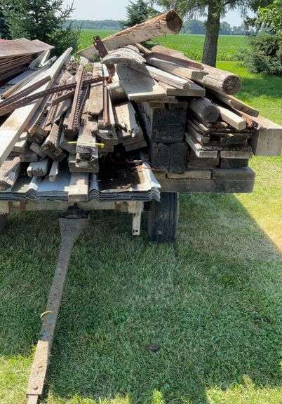 Assortment of Lumber and Large Timbers , 18 sheets of 19ft roof steel.