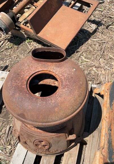 Old cast iron pot belly stove, from US Army Cannon heater #20