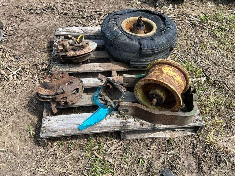 Pallet of John Deere front end single rims & mounts w/2 brake assemblies