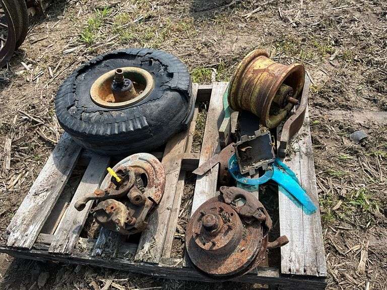 Pallet of John Deere front end single rims & mounts w/2 brake assemblies