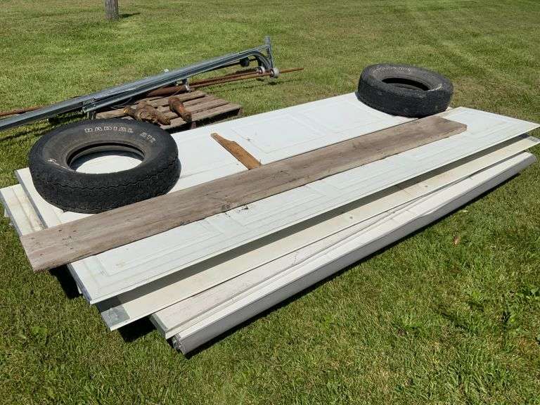 Over head Garage Door with springs, may be missing parts, may have extra pa