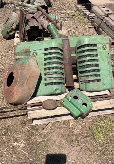 JD parts off A ; hood, side shields, exhaust, fly wheel cover, dash
