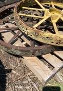 (2) JD metal rims w/cast centers off John Deere B, flat spokes