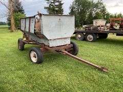 Walsh metal flare box on running gear w/ firewood