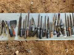4 coffee cans of screwdrivers, pliers, and box of nails