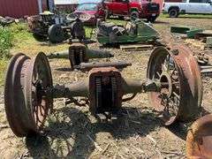 John Deere A rear end housing & axles w/round spoke metal rims; axles fit J