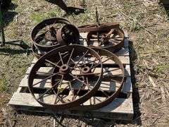 (2) 28" iron wheels w/hubs & misc pulleys & wheels
