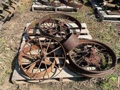 (2) 28" iron wheels w/hubs & misc pulleys & wheels