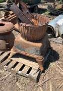 Old cast iron pot belly stove, from US Army Cannon heater #20