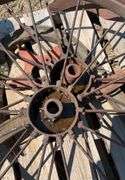 pallet of (2) metal flat spoke wheels, 3ft diameter, & (2) one bottom plows