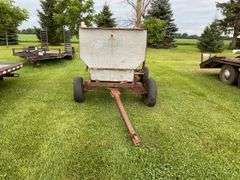 Walsh metal flare box on running gear w/ firewood